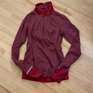 Lululemon half zip raspberry coloured shirt, size 2 dot